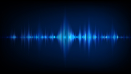 Image of sound waves oscillating in blue against a black background.